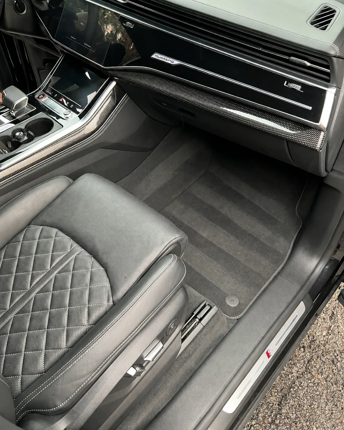 Carefully cleaned premium Audi interior and passenger footwell